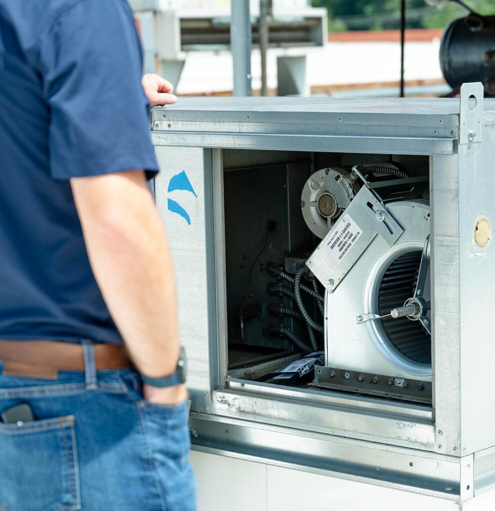 Technician undergoing training on installation and maintenance of HVAC unit