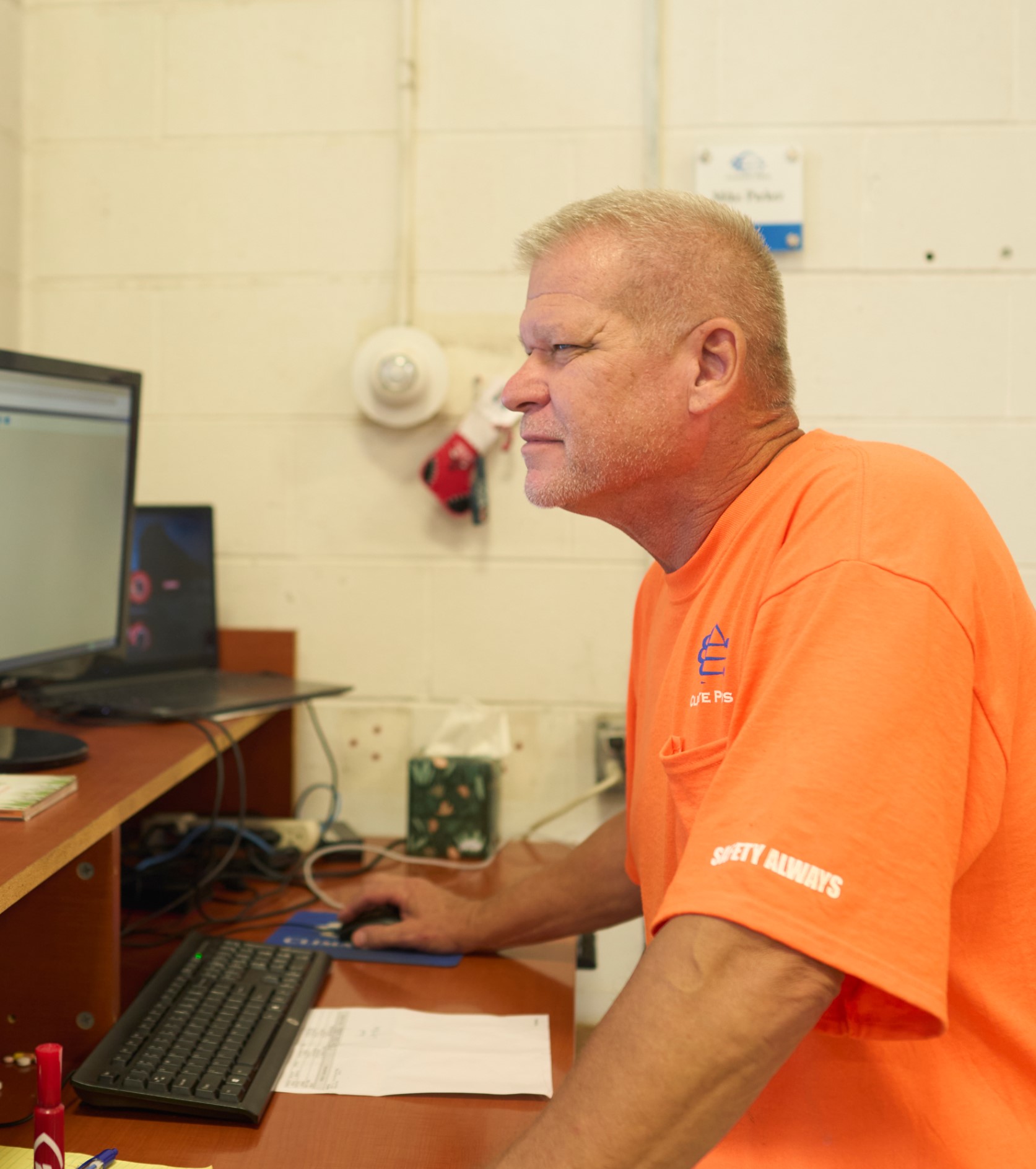 Man working on plans and performance reports on HVAC and refrigeration technology